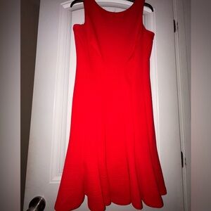 Red midi dress with gold zipper detail. Size 4